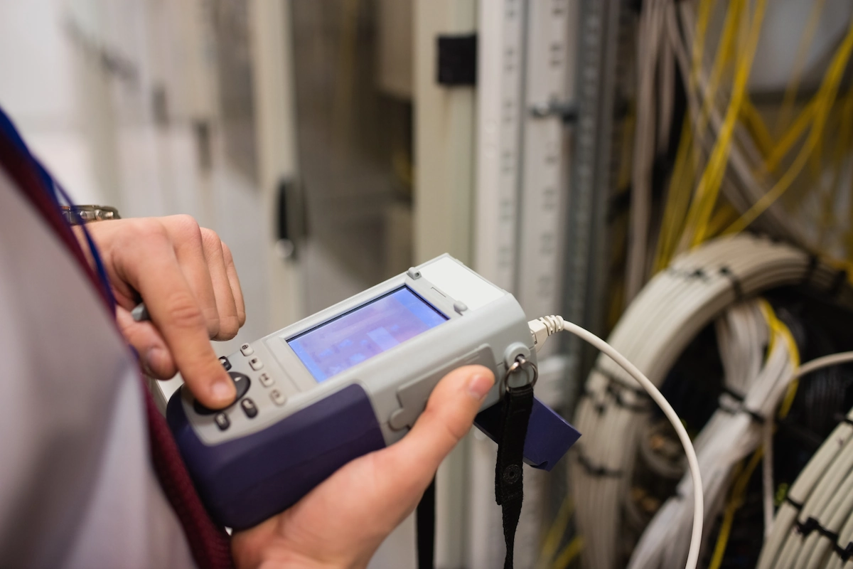a technician uses an analyzer