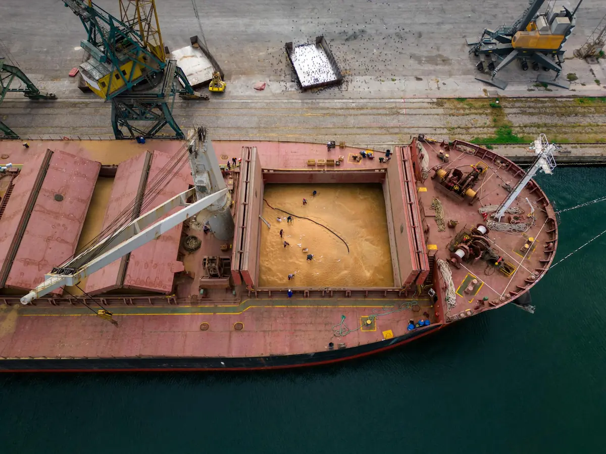 The fully loaded cargo ship is preparing to depart